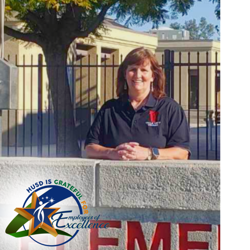 Smiling image of Sue in front of Valle Vista.