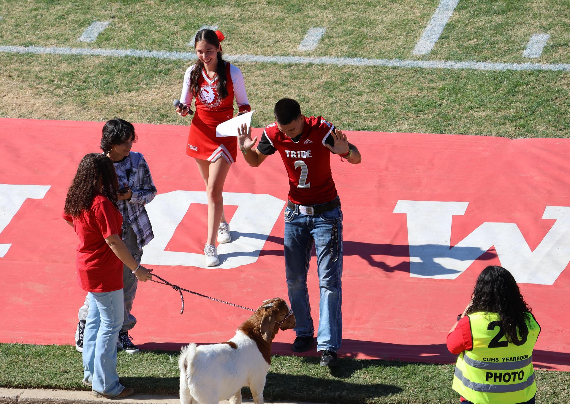 students and staff at the homecoming rally