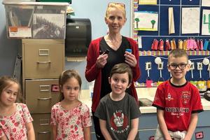 Nurse Donatelli (back) with her volunteers, Bella Monroe, Emmy Monroe, Dominic Colecchi, and Nate Byers