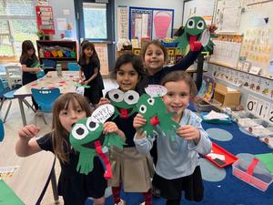 Students proudly display their hoppy purim cards.