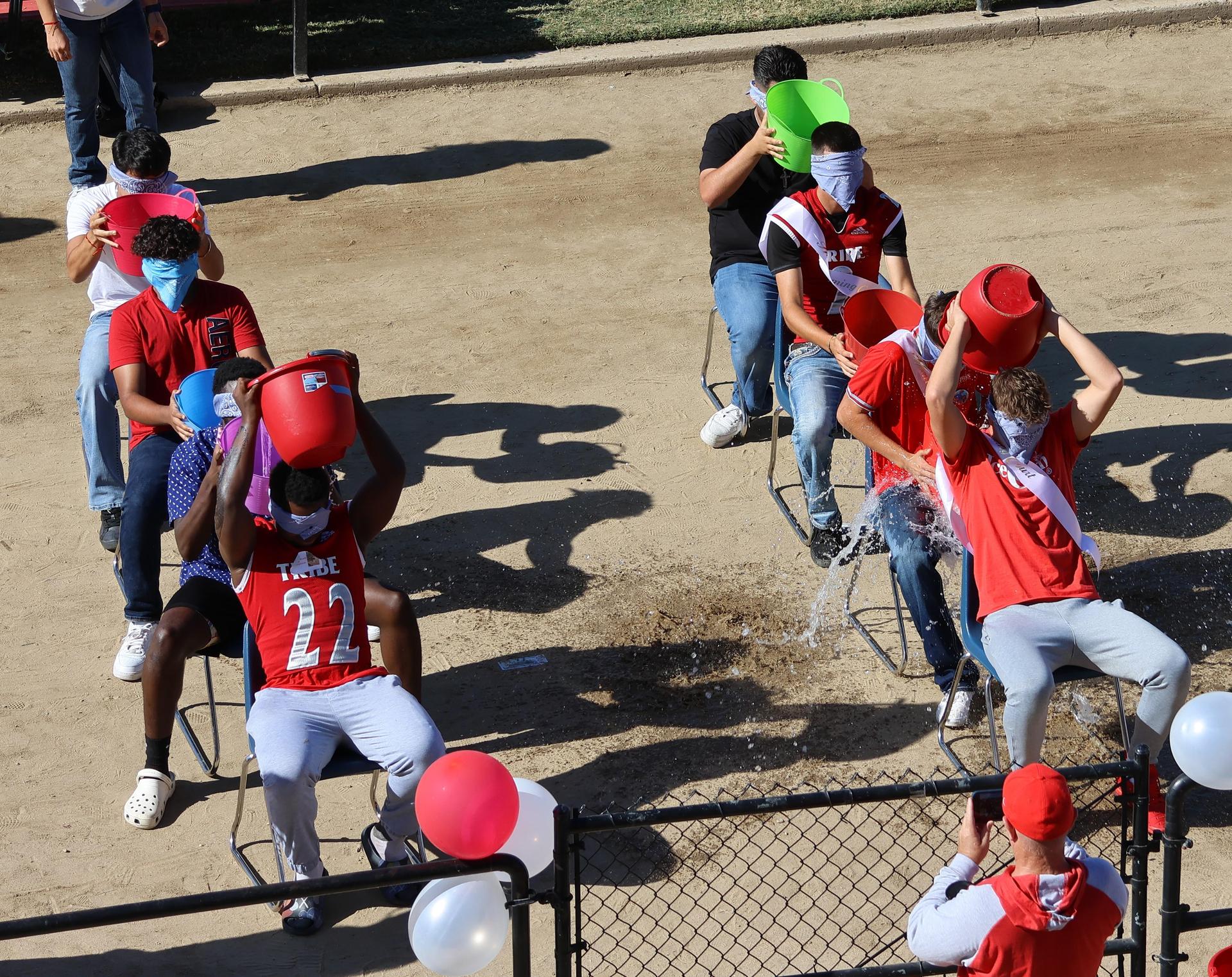 students and staff at the homecoming rally