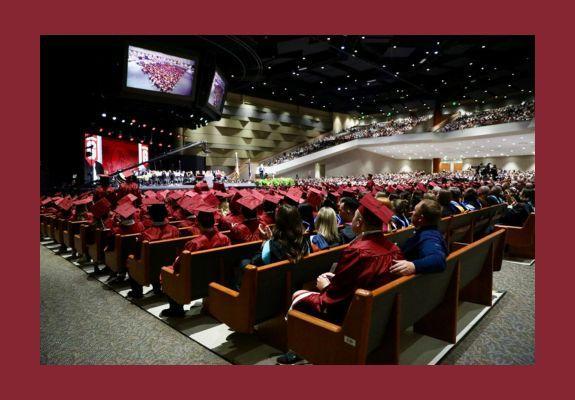 GHS graduation with maroon gowns and caps