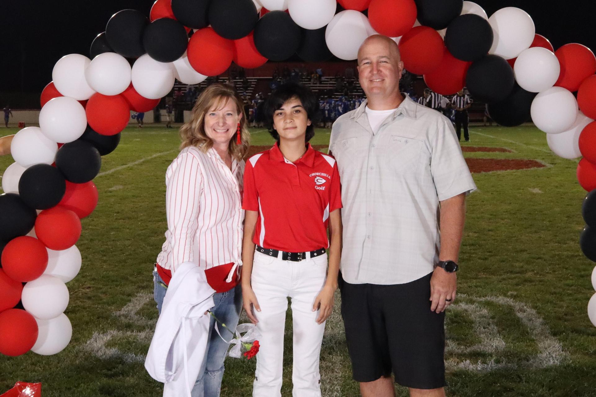 seniors and their escorts celebrating senior night