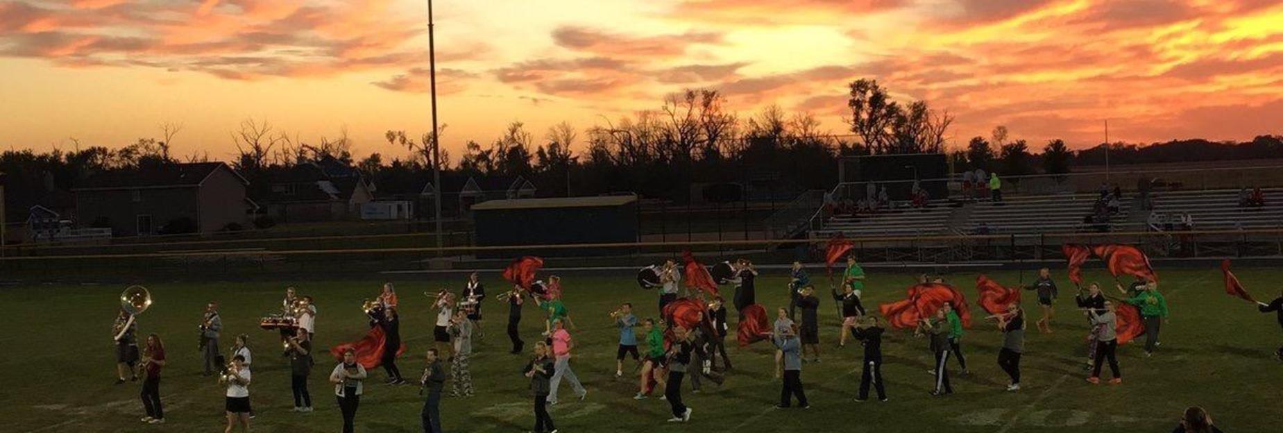 Band performing at dusk