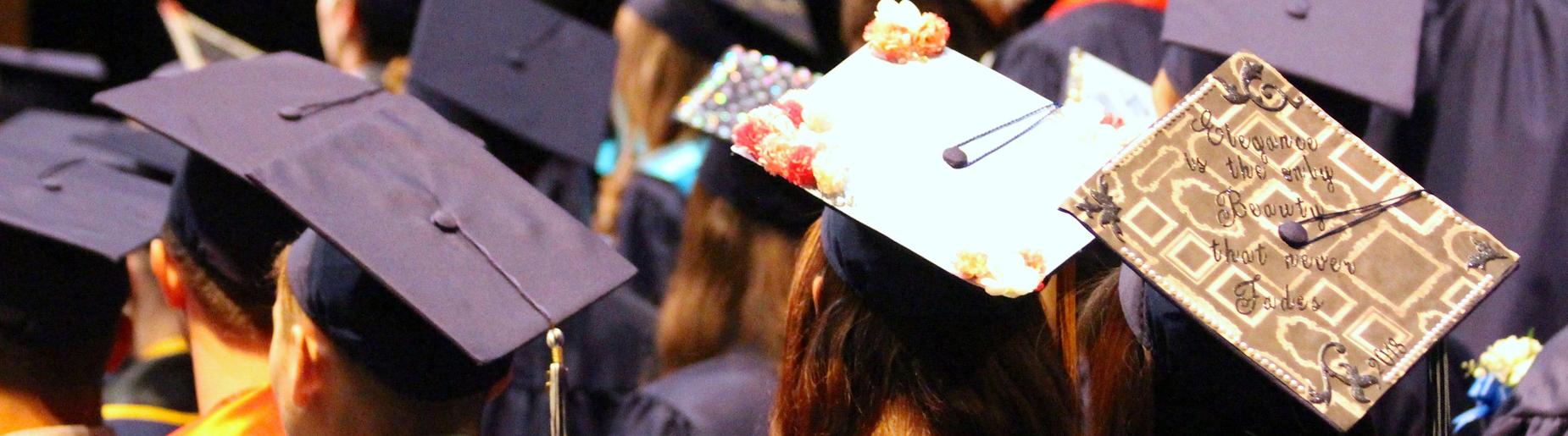 Gananda Central Schools Ruben A. Cirillo High School back view of graduates caps 2018