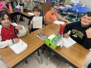 Mrs. Roe's fourth graders reviewed opinion writing by participating in OREO writing today! Their prompt was “Should girls be allowed to play football?” Of course, they ended with a little snack!