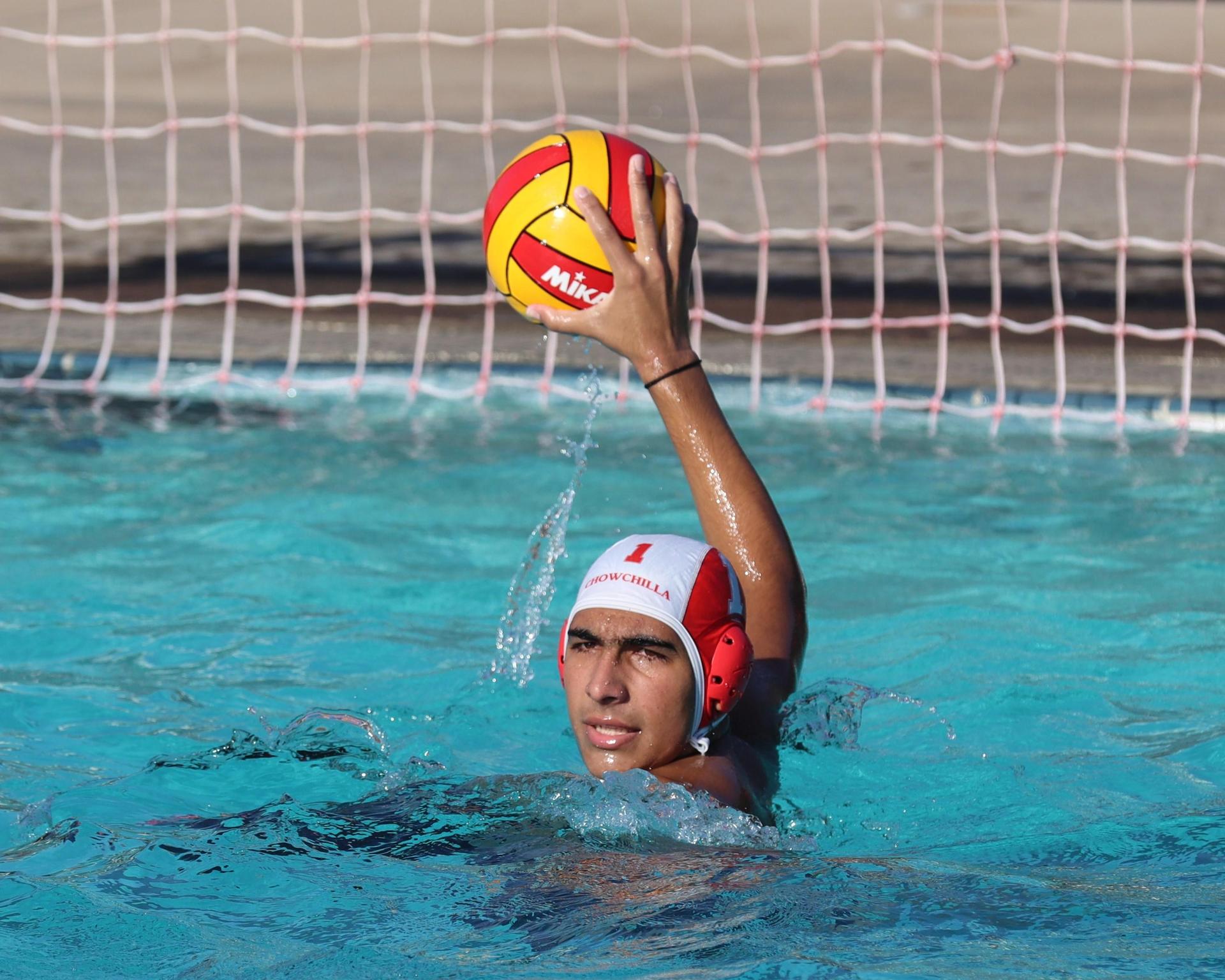 Boys playing water polo against Yosemite