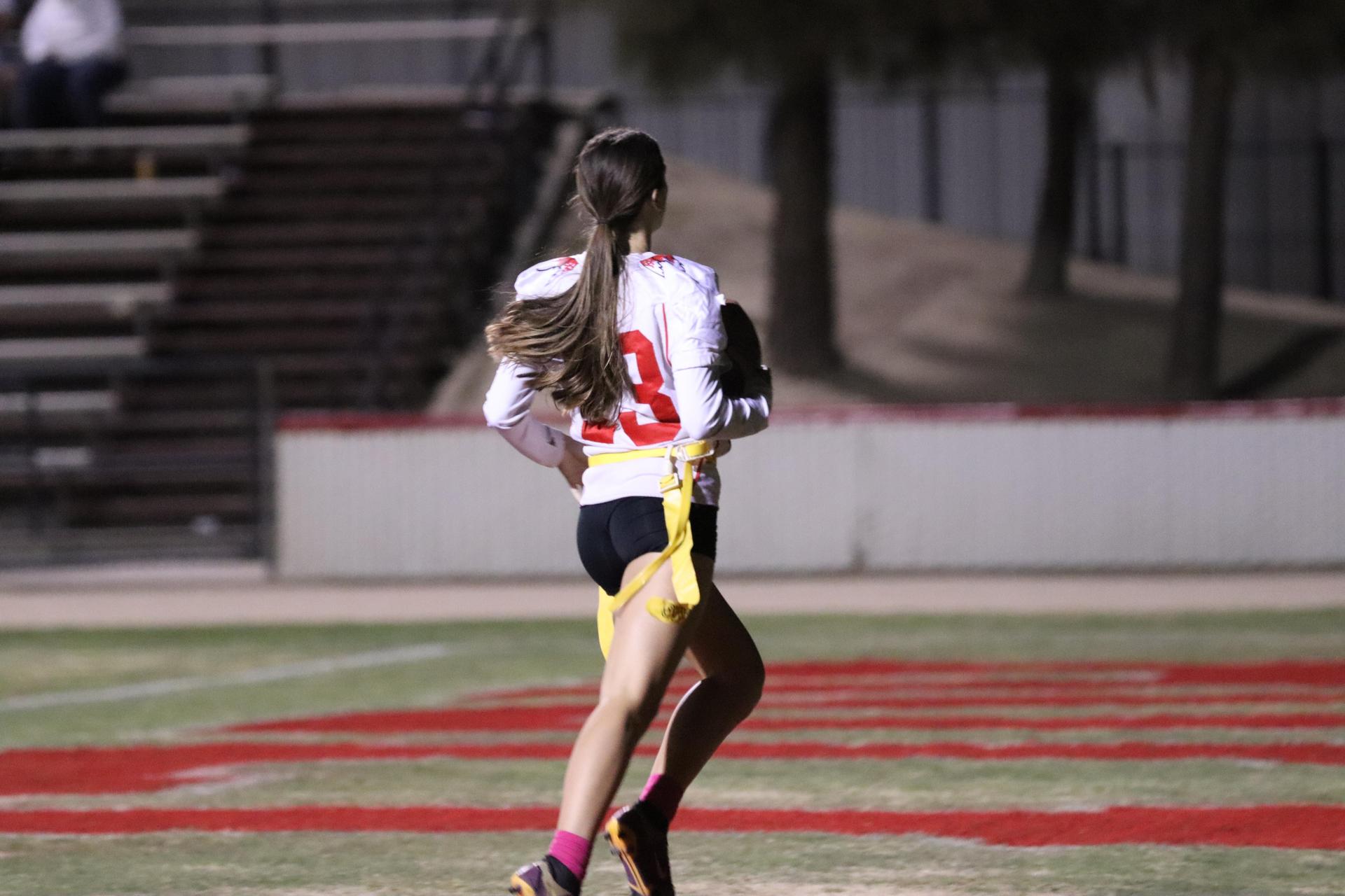girls playing flag football