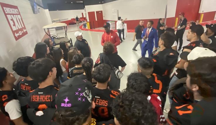 Football players meet the '49ers