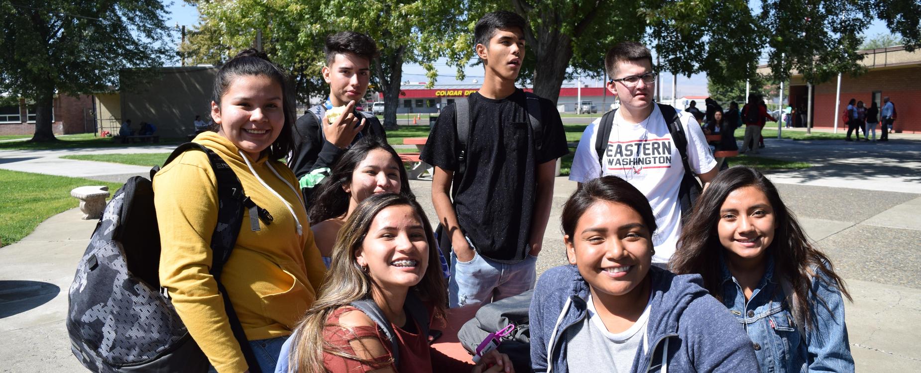 Students sitting outside
