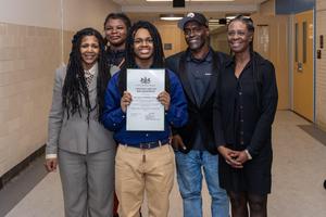 Xaiveyon poses for a photo with Costa rep