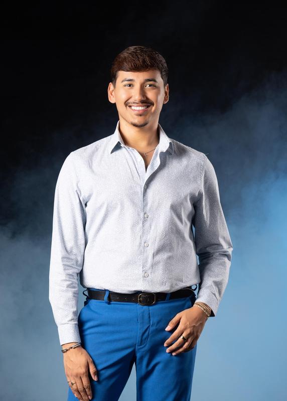 Erik Prospero headshot in dance studio