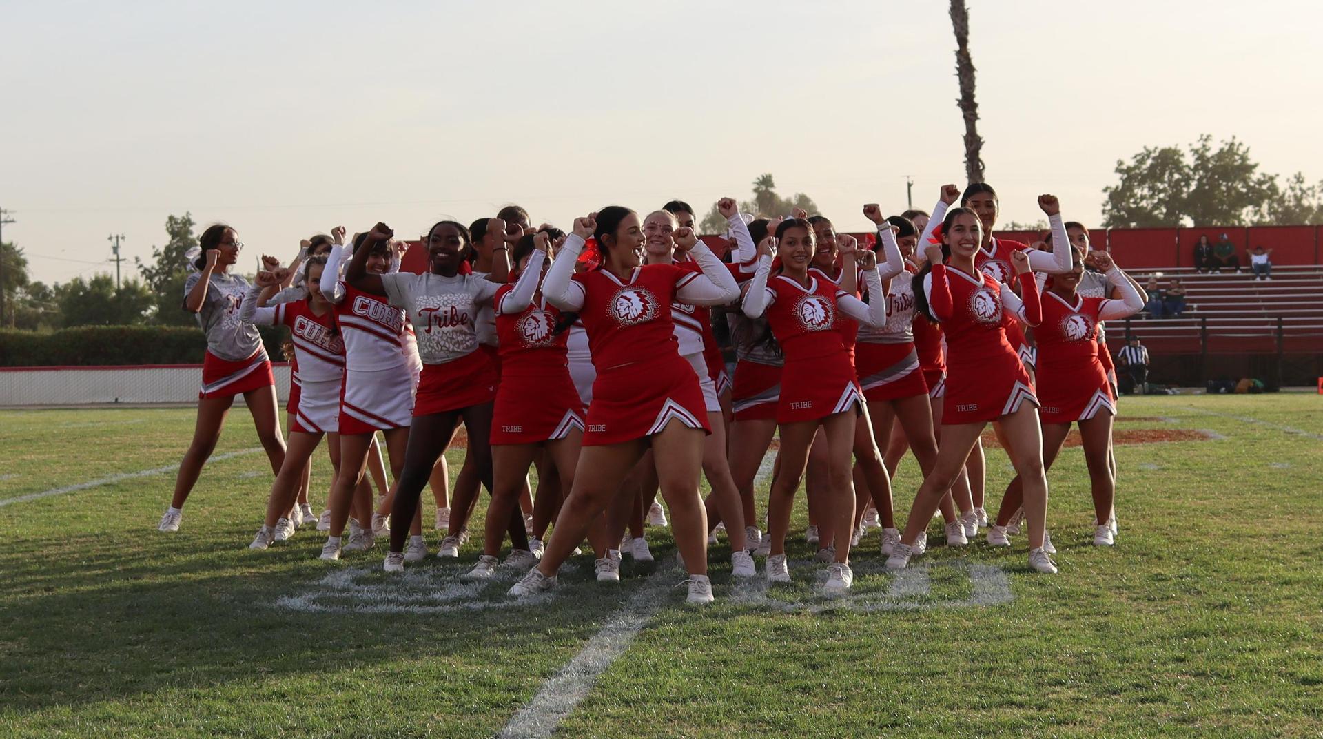 Cheerleaders performing at the football game