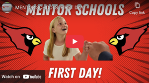 Picture of a girl fistbumping on the first day of school
