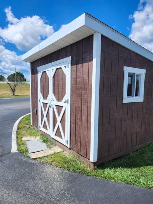 A shed built by the Building Construction students that is for sale.
