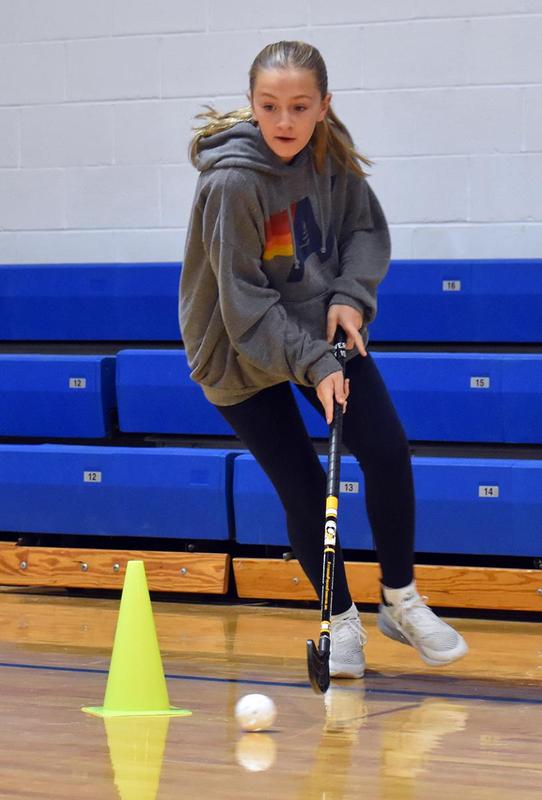 A person holding a stick