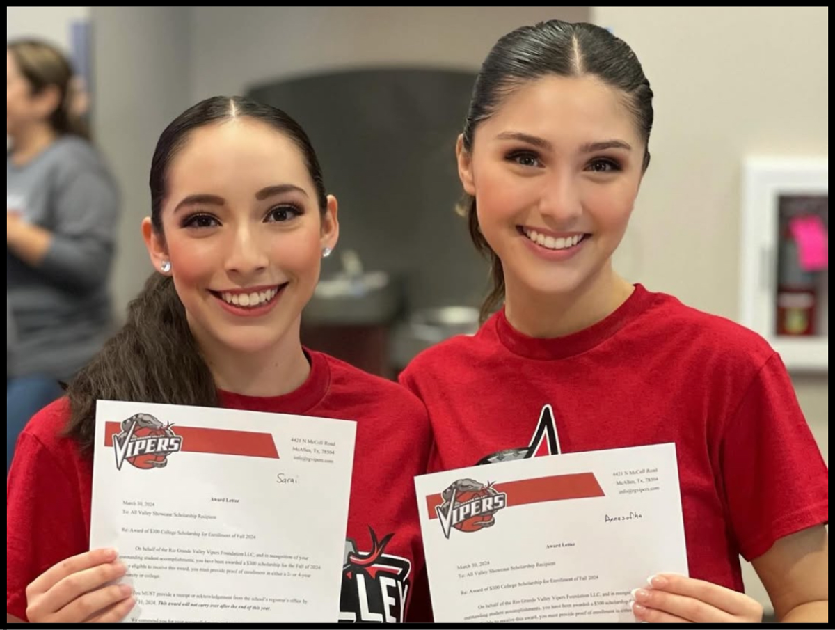 Two Dance Girls holding certs