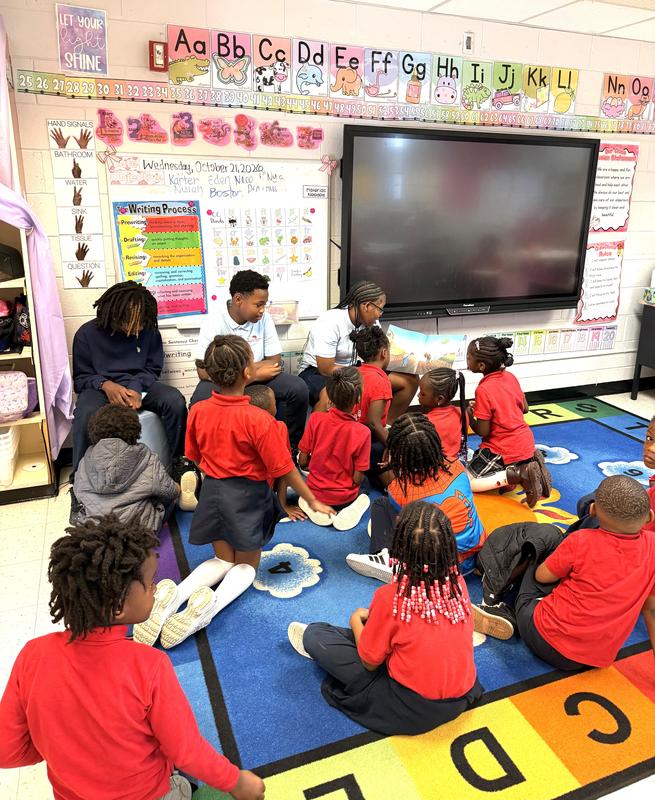 'Brains Behind the Main' Students Spread Kindness Through Reading Featured Photo