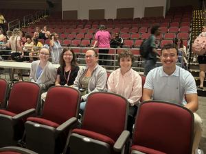 Staff gathering in the auditorium