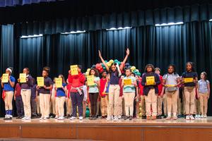 Fifth grade students act out the Olympics