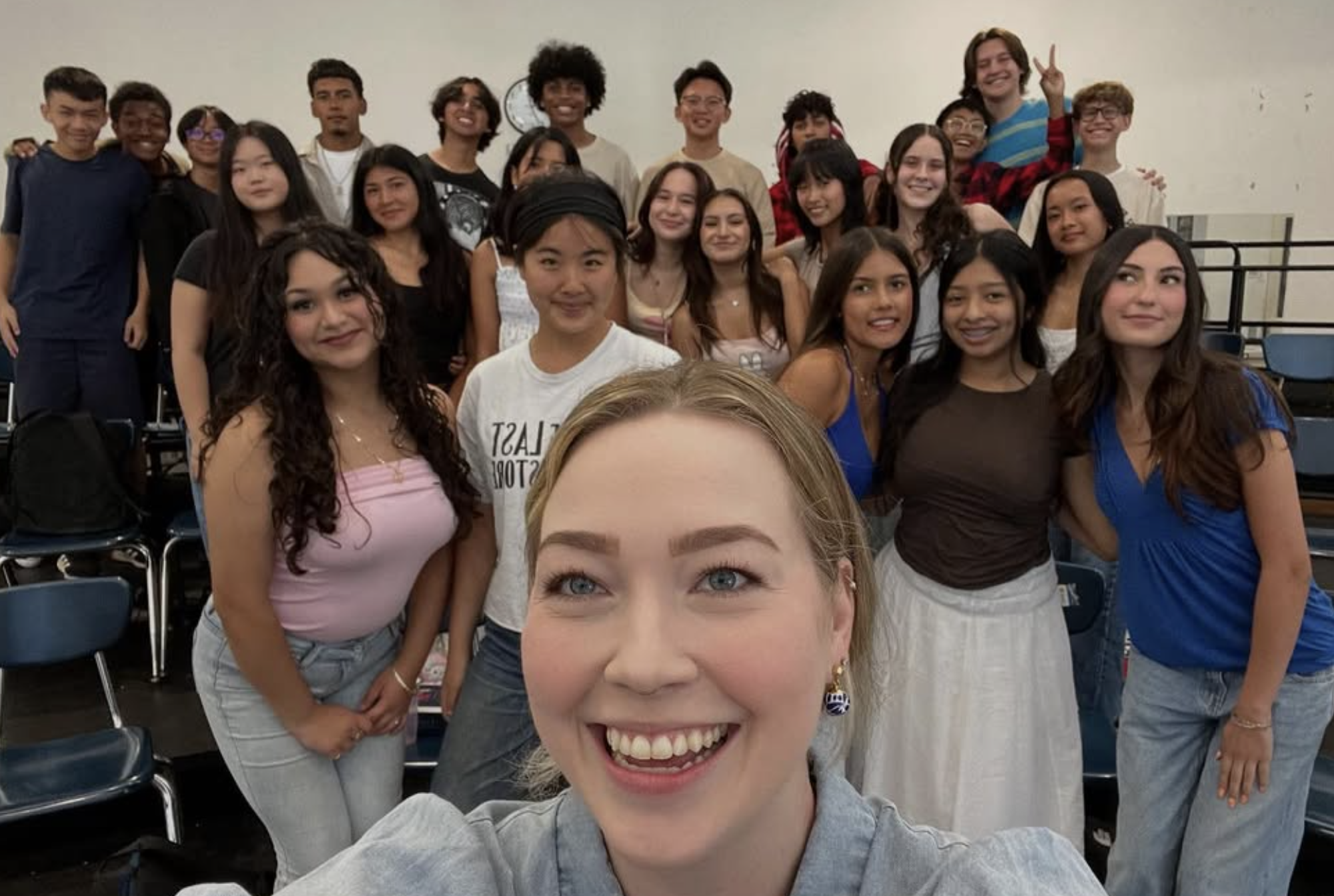 Instructor is taking a selfie with the 2026 singers
