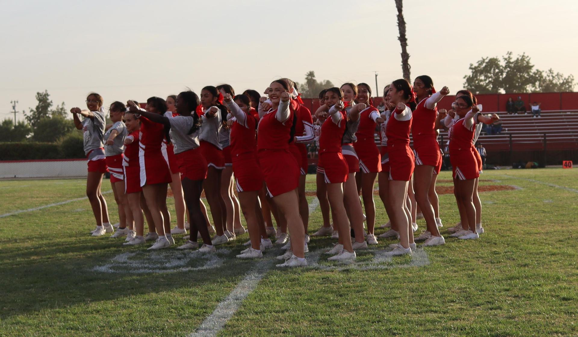 Cheerleaders performing at the football game