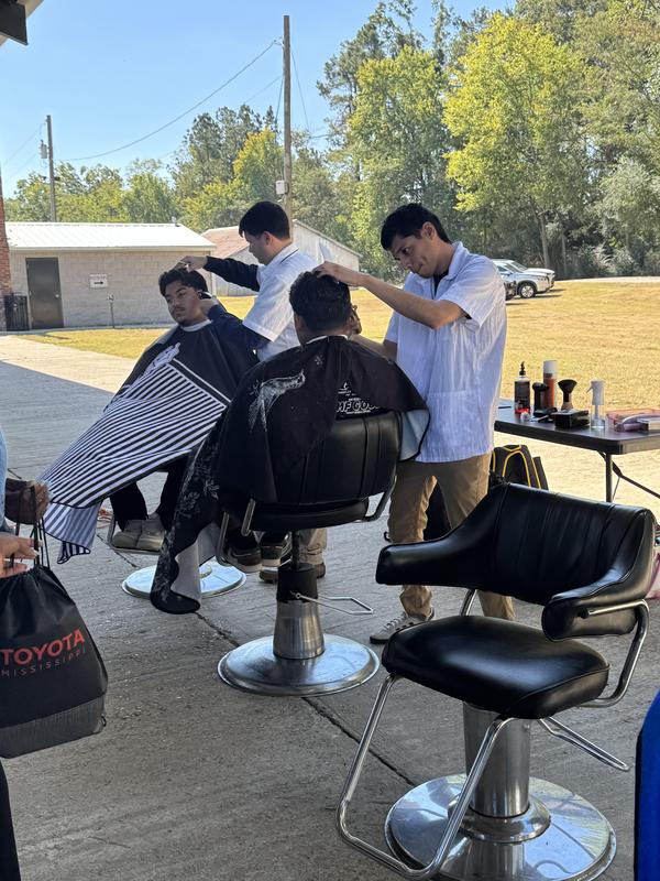 Students getting haircuts
