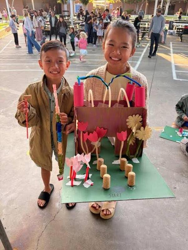 Students with Mini Golf project at Newland STEAM Night
