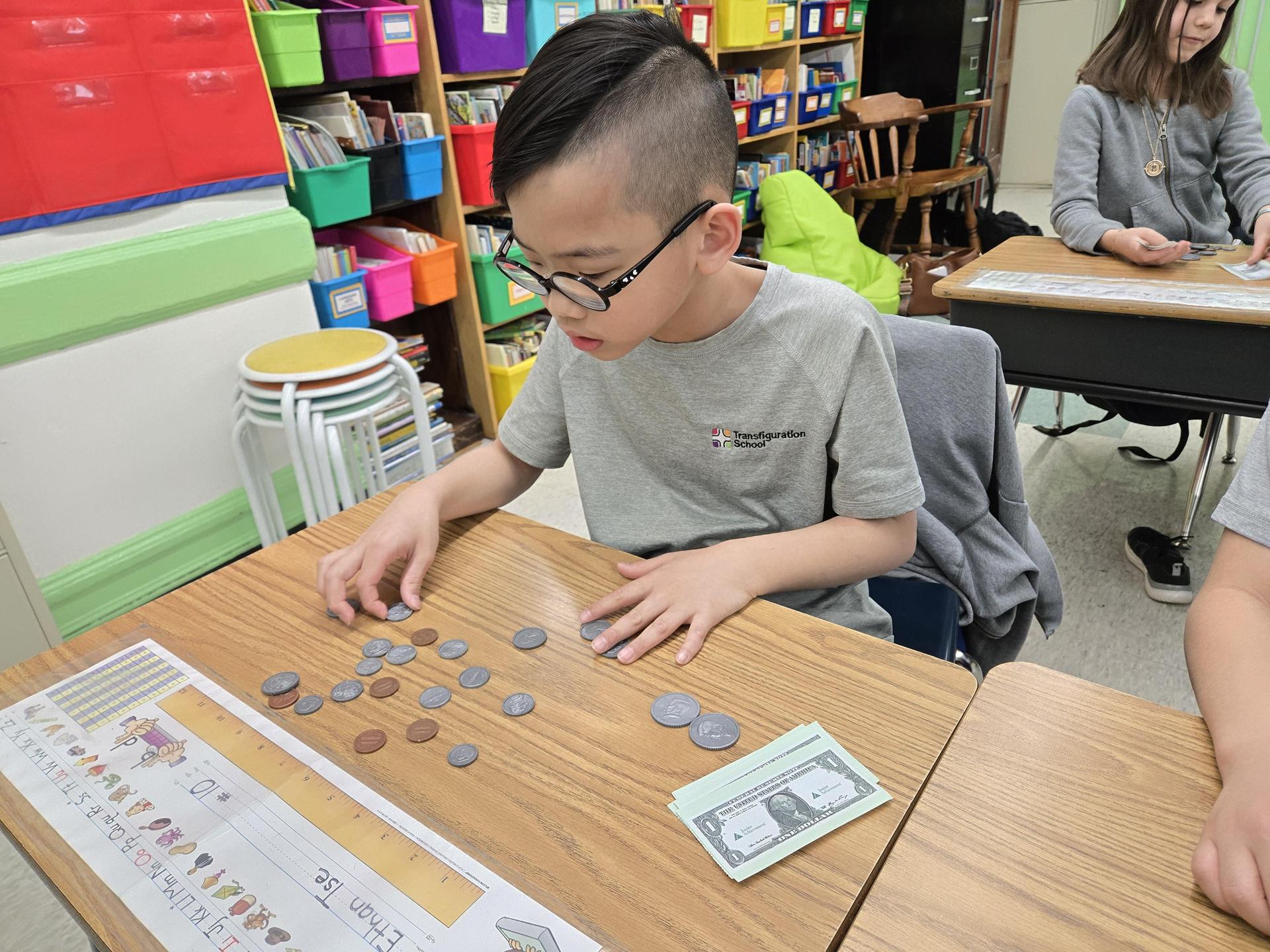 student counting money