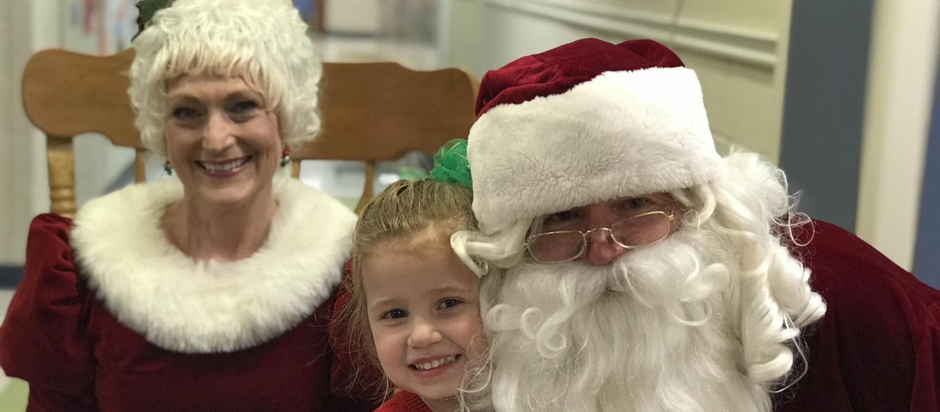 Mr. & Mrs. Claus and child