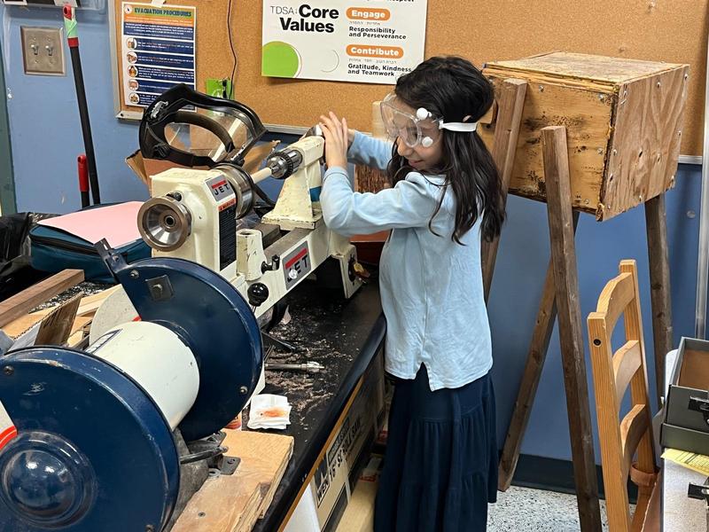 A student working on their grogger.
