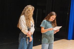 Lindsey Pierson Mrs. Baird's Teacher on the Rise Recipient and Ellasyn Stevens reading letter