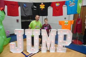 Grey McKeown raised the most funds and is pictured with Mr. Thaler.