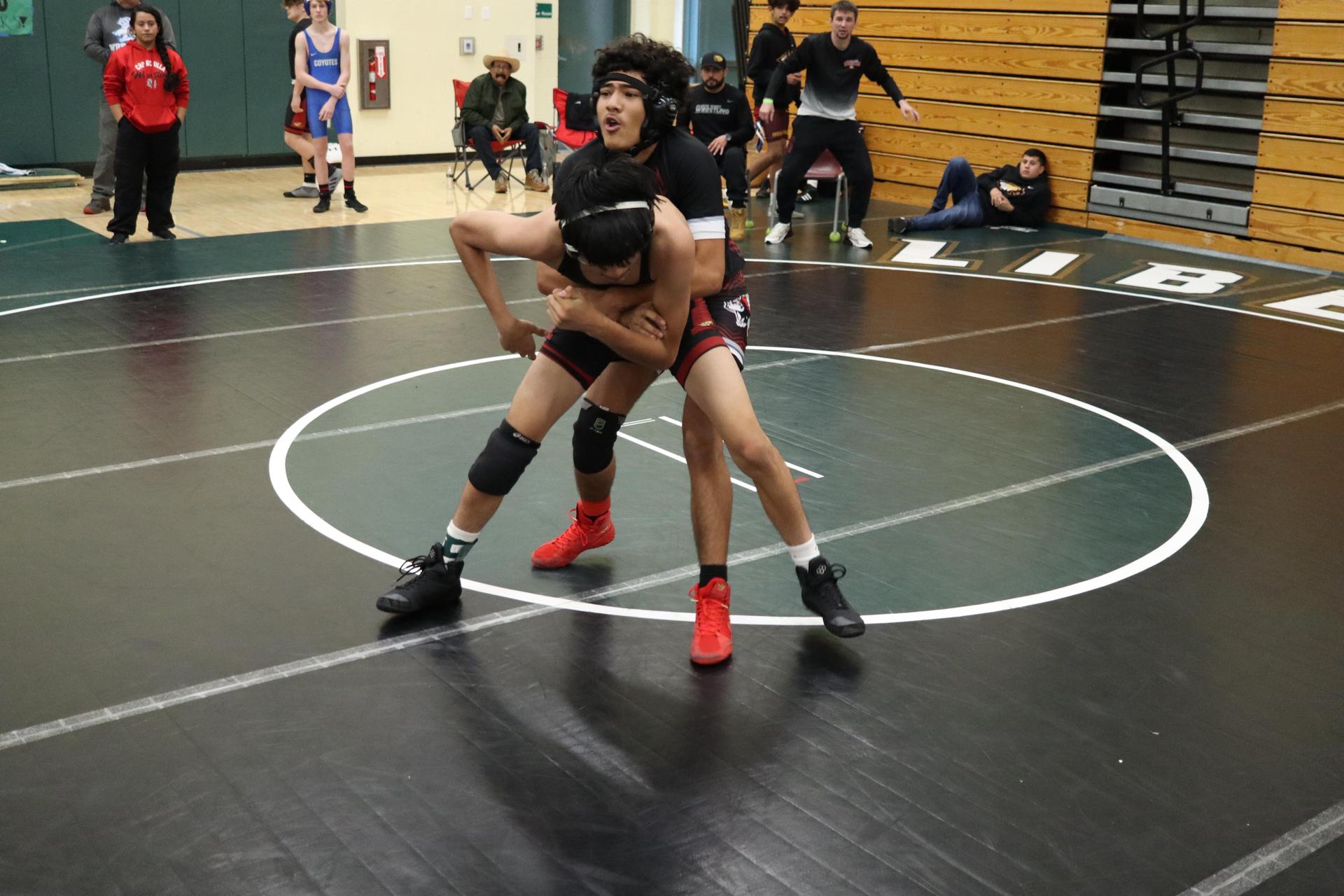 wrestlers in action at the Hawks invitational
