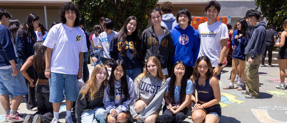 students writing their post-school plans in chalk on the tiger patio