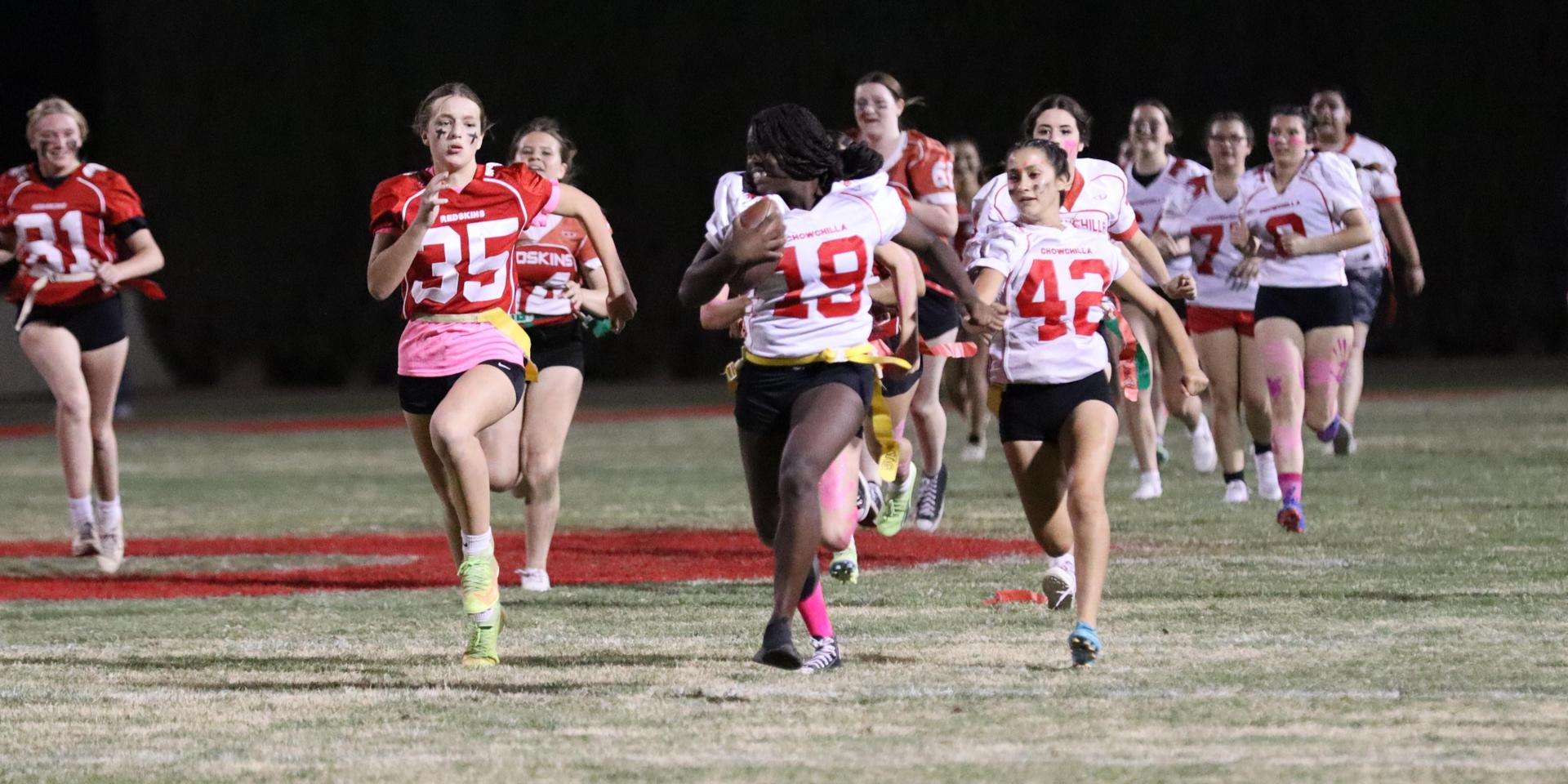 girls playing flag football