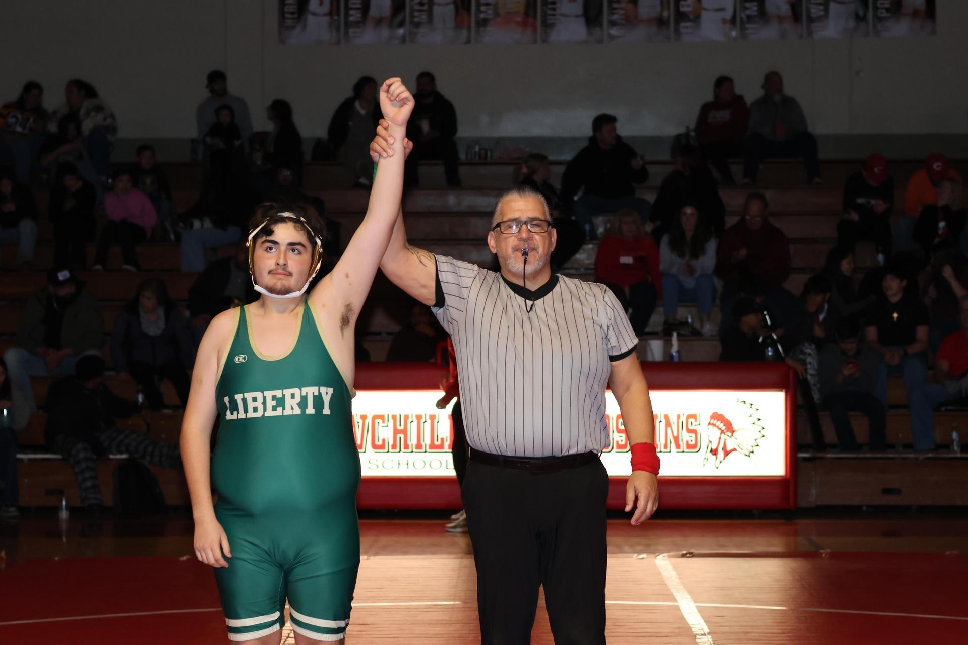 Wrestling winners with hands up 78