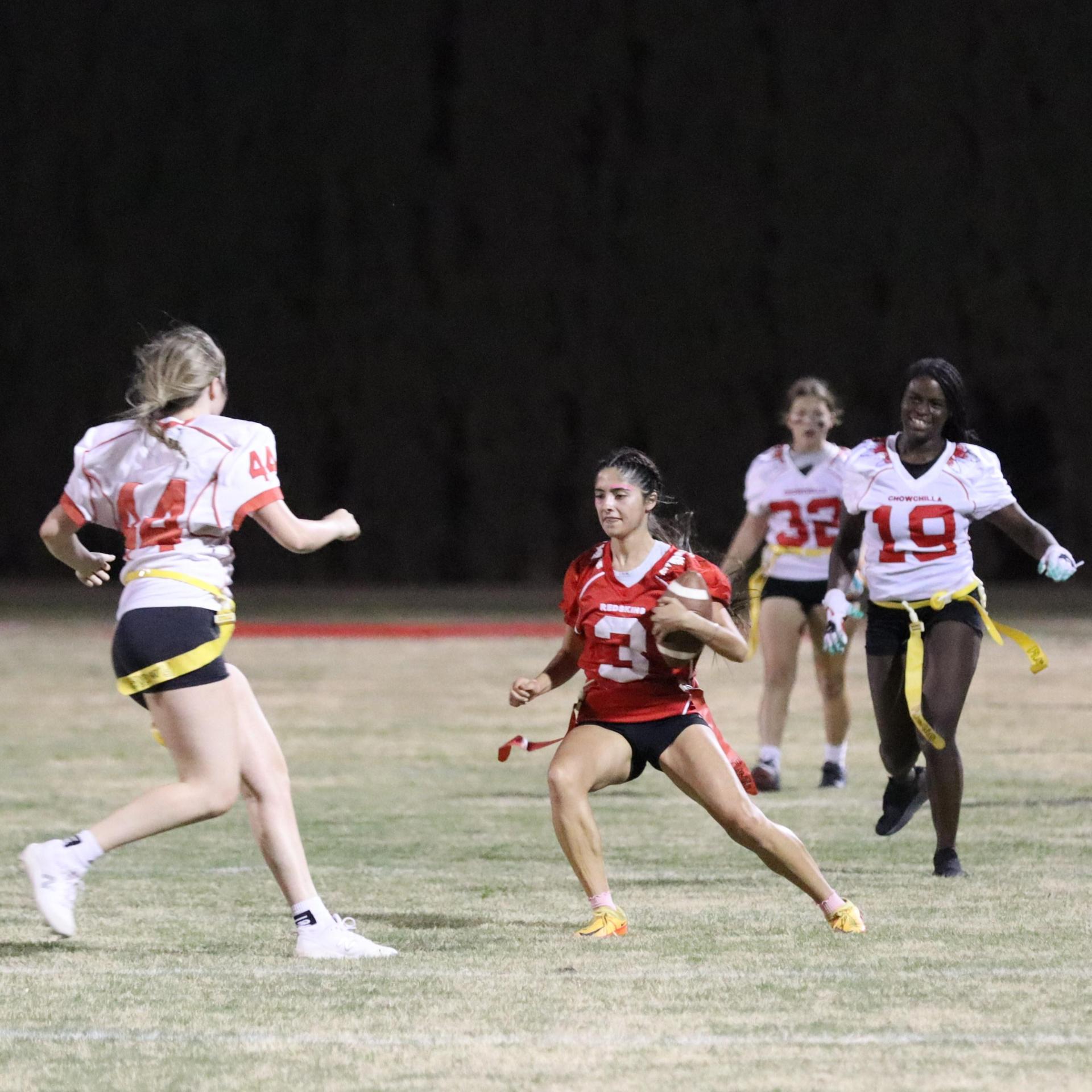girls playing flag football