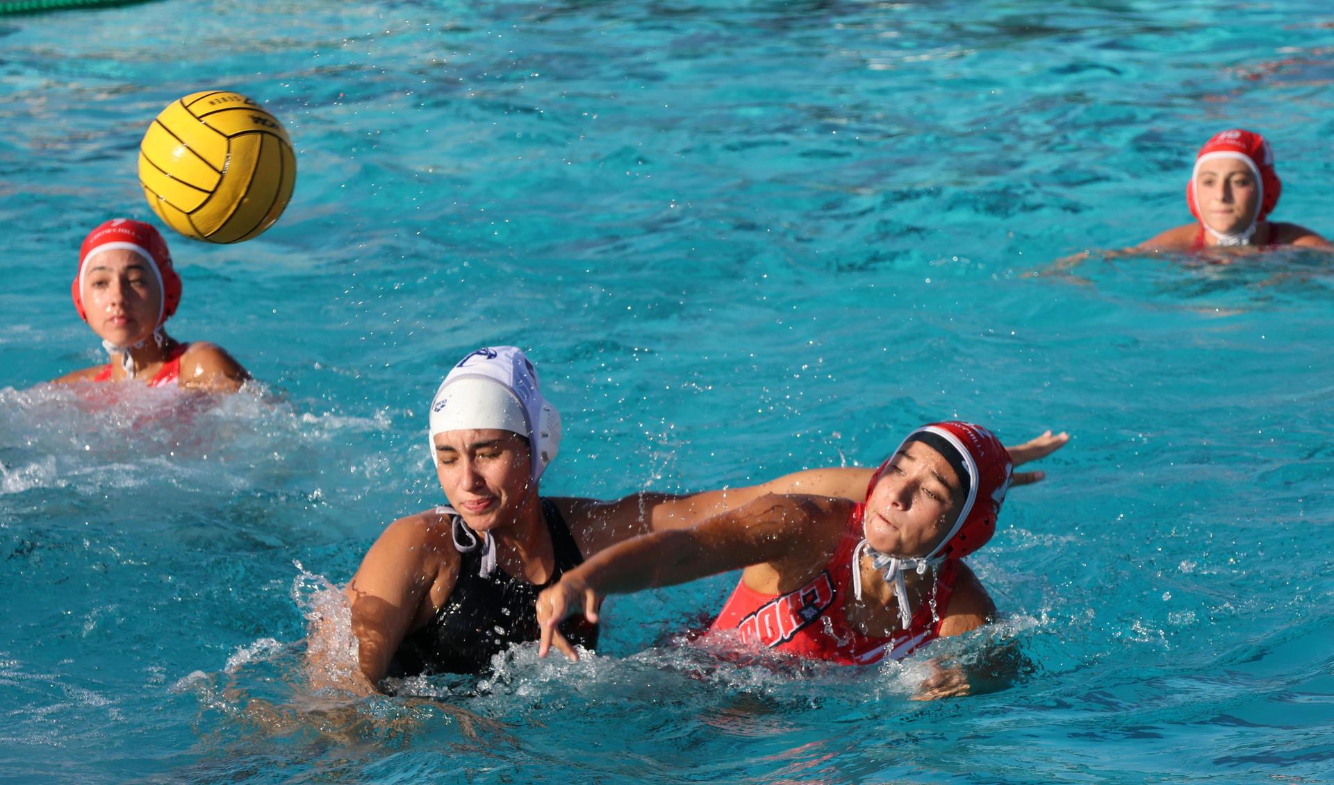 girls playing water polo against Sanger West