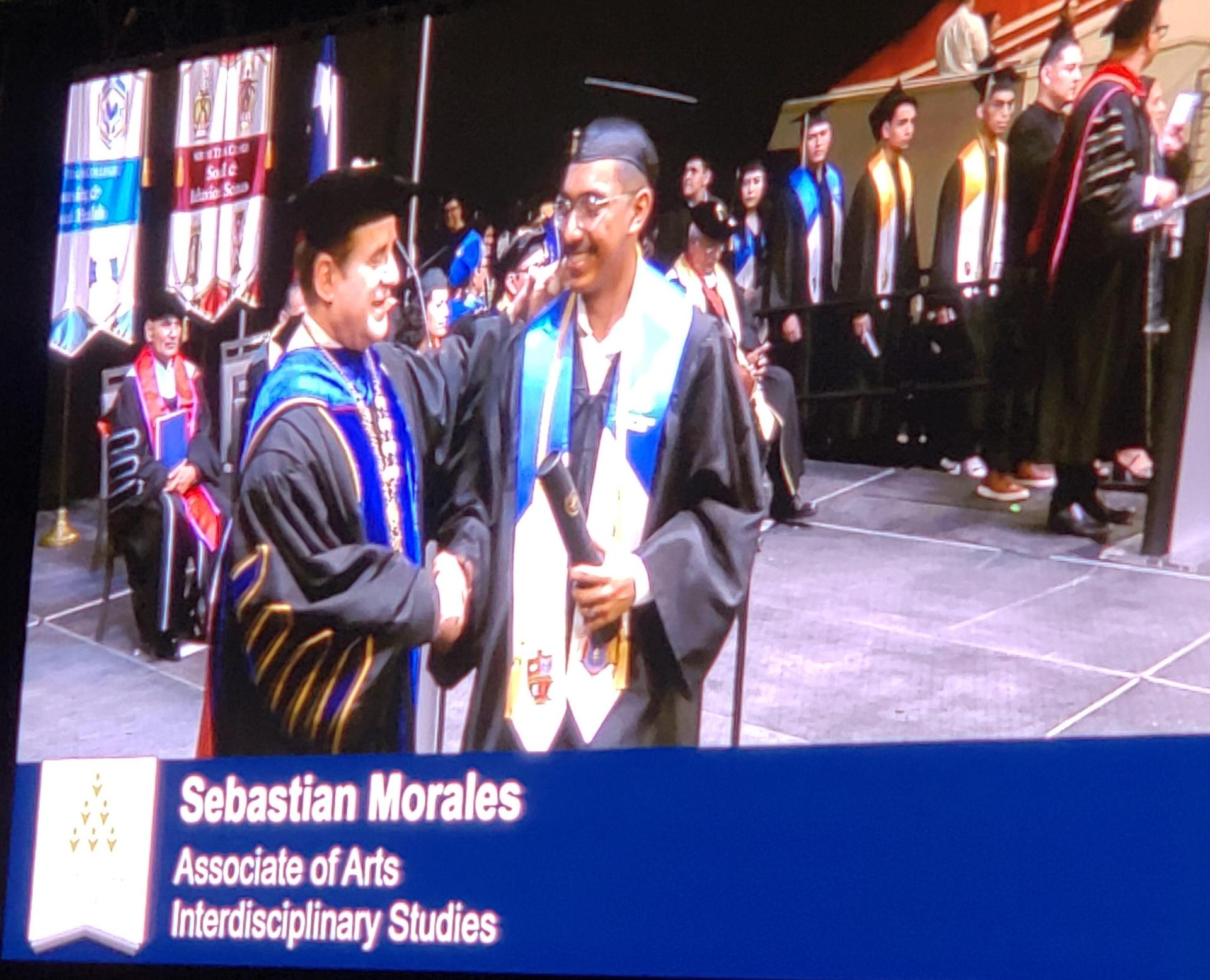 Receiving diploma