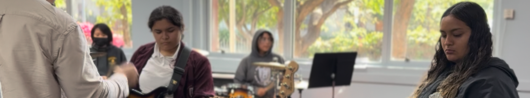 Girls playing instruments in the music academy