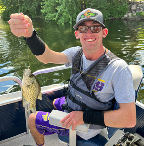 Adult male holding a fish
