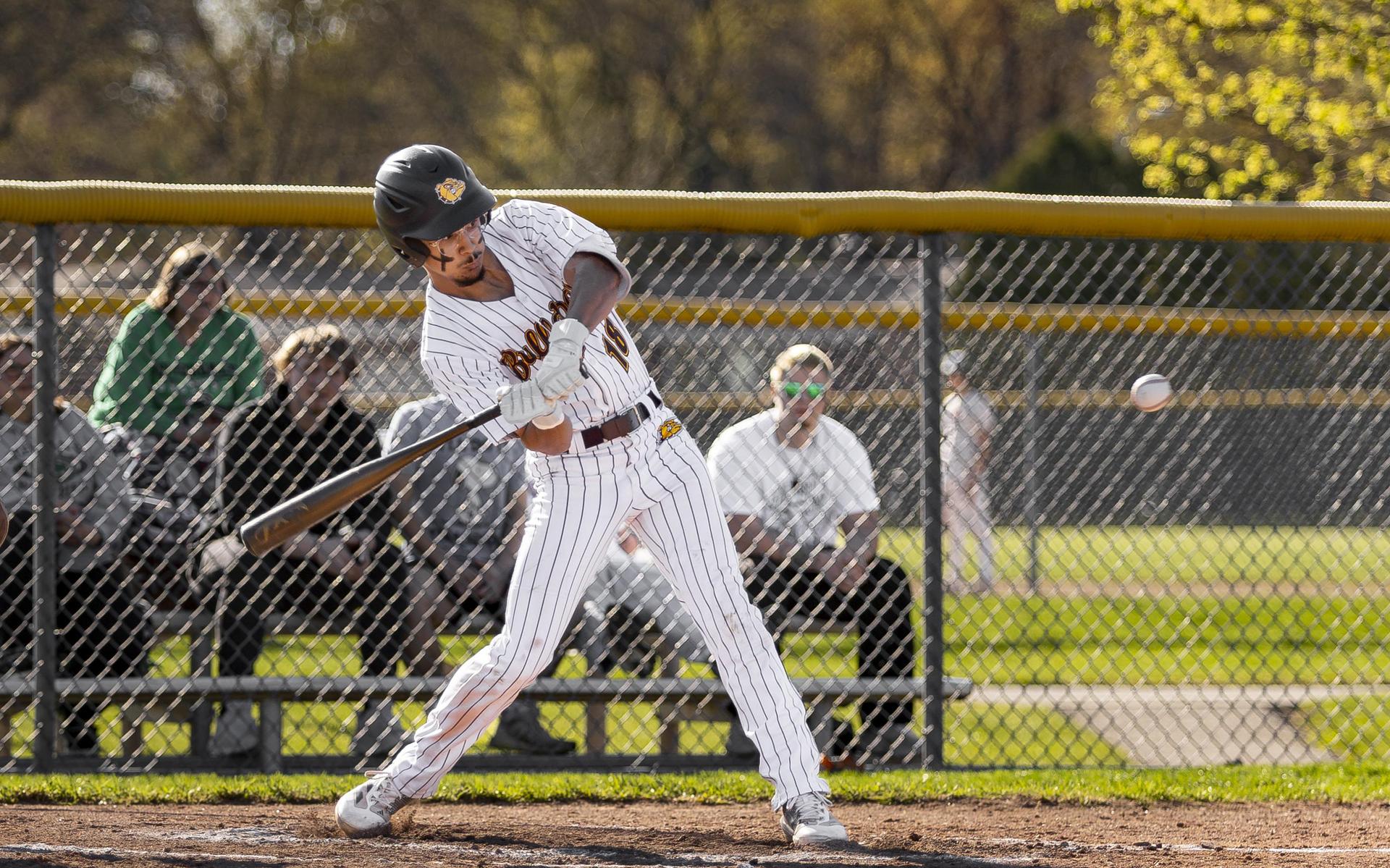 Baseball player swinging the bat