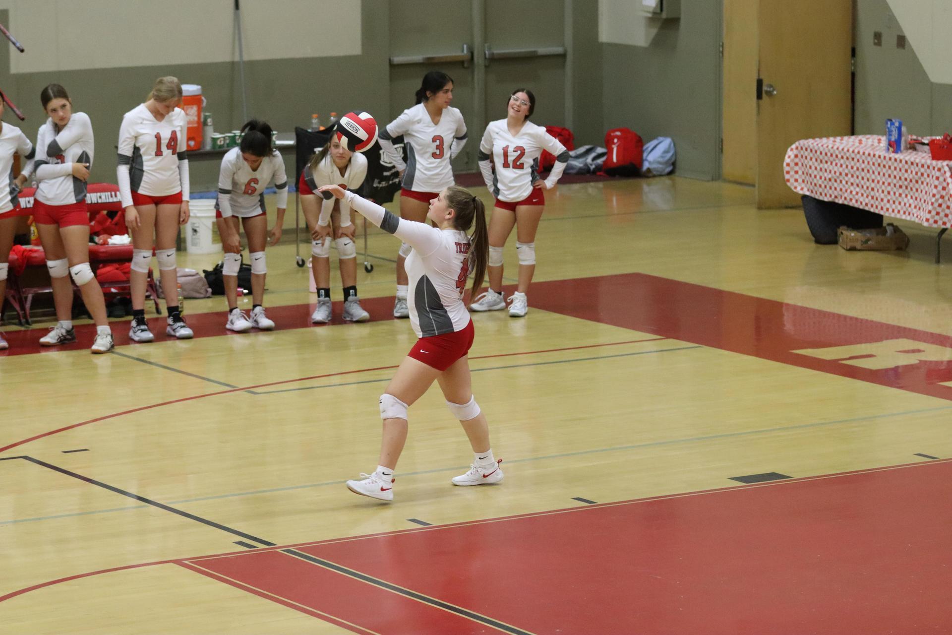 junior varsity girls playing volleyball against Mendota