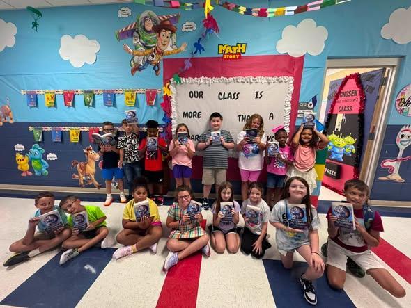 Thank you to Pass Christian Rotary Club for sending dictionaries for every third grade student!!!! 💙❤️🤍. #reachforthesky Featured Photo