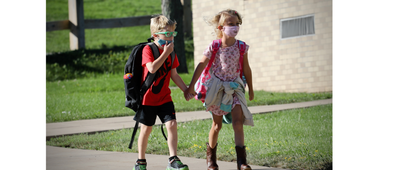 2 students walking to school