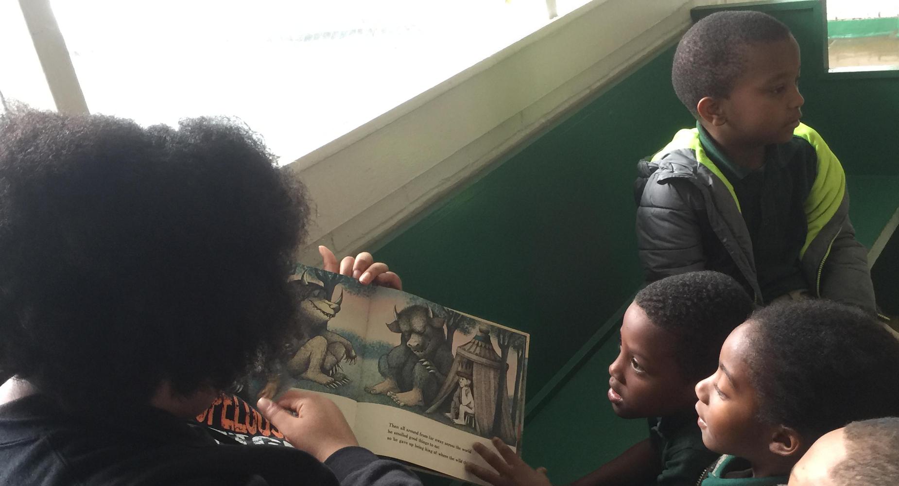 OHS Book Club students read to local elementary school students for Read Across America Day.
