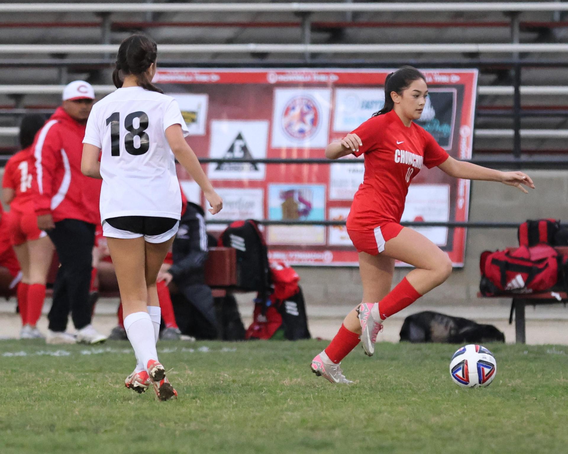 Junior varsity girls playing soccer against liberty