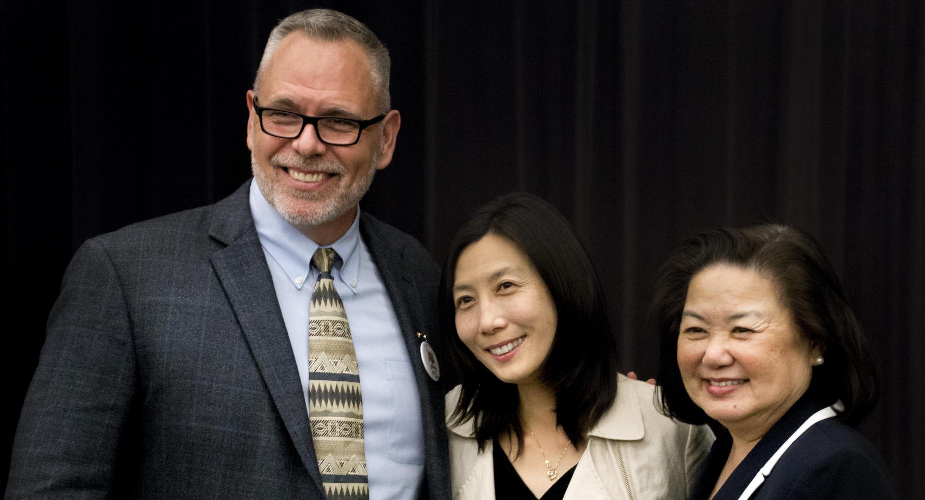 Dr. Sieu, guest speaker, and school principal
