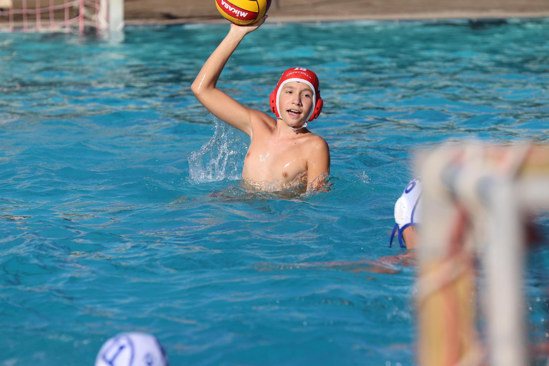 boys playing water polo against Madera